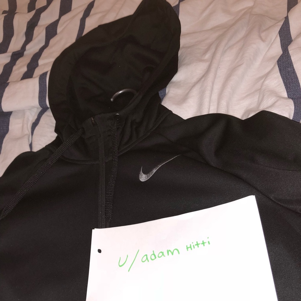 Nike zip-up hoodie.